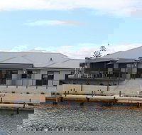 Port Bouvard Retreat - Large Family Friendly Canal Home with Private Jetty - Accommodation Brunswick Heads