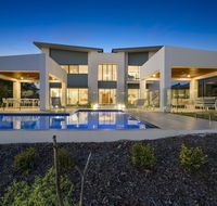 Luxury Canal Front Holiday House Raptor Pde Banksia Beach - Accommodation Brunswick Heads