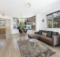 Lower Bridge and Sails - Executive 2BR Darlinghurst Apartment with Balcony and Rooftop Views - Accommodation Brunswick Heads